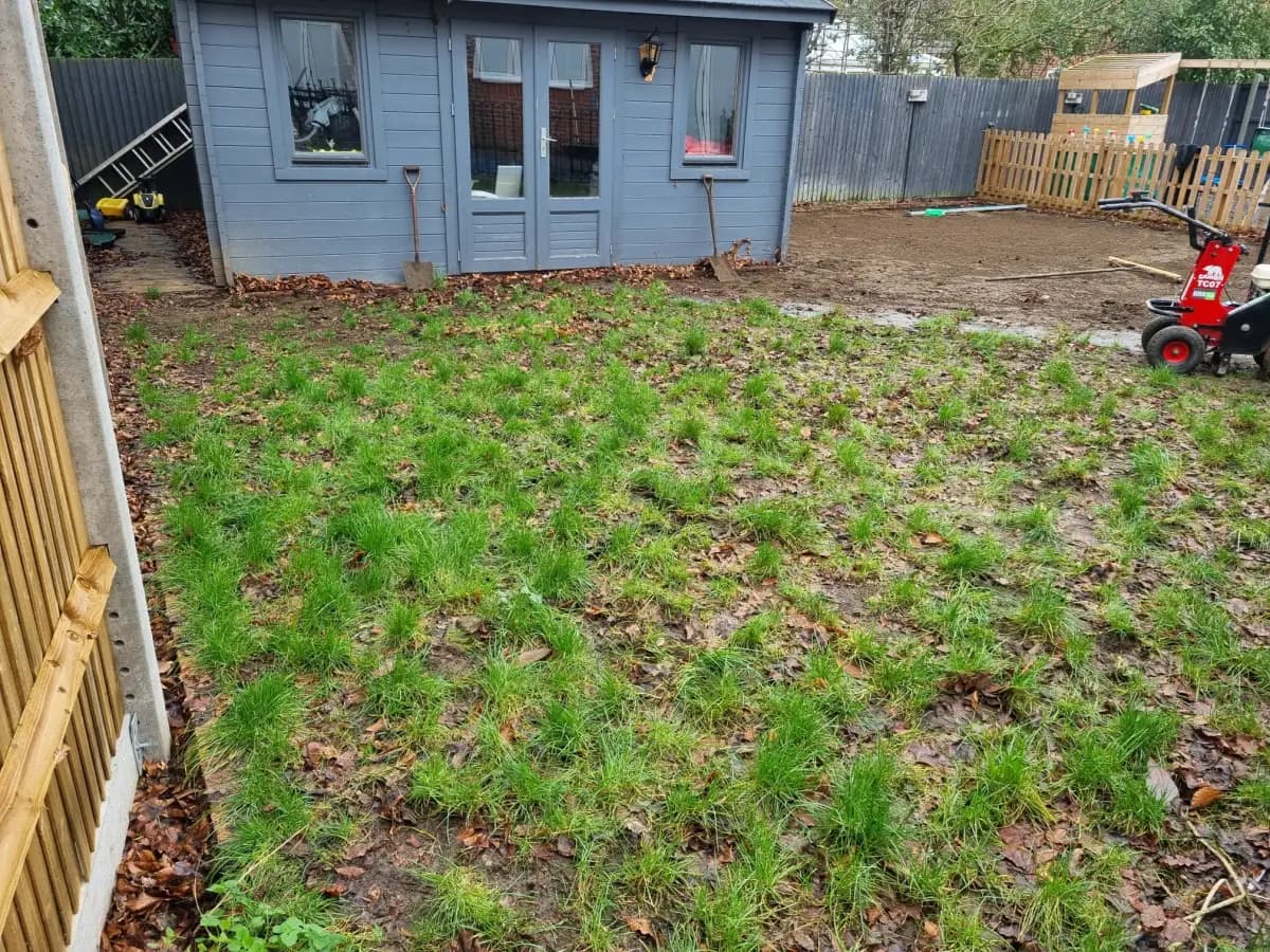 Dartford garden before installation with bare, uneven soil